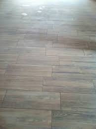 Laying stone floor tiles on floorboards. Tile Laying Stone Finishing Paving And House Design Home Facebook
