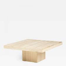 Rich in character, each unique table is polished in clear matte for a smooth finish all around. Italian Travertine Coffee Table