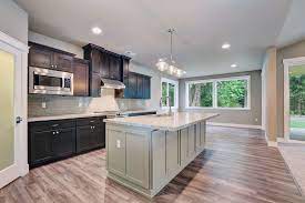 Maybe you would like to learn more about one of these? Espresso Cabinets With Dorian Gray Island Quartz Counters Laminate Hardwoods Cascade Laminate Modern Kitchen Island White Modern Kitchen Espresso Cabinets