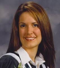 Lighting candle for deceased daughter