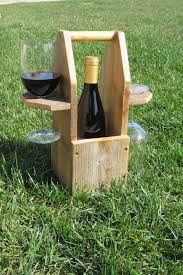 Moreover, on the market, there are available wooden outdoor wine glass holders that are ready to use. Reclaimed Wood Wine Bottle Caddy And Wine Glass By Luciredesign Diy Holz Weinflasche Wein Halter