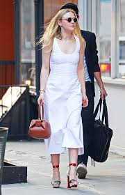 This is an oasis like no other! Dakota Fanning Style Jeans A Tee