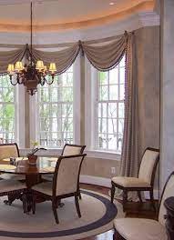 When paired with short café curtains or drapes, valance curtains can also add a layered effect to your windows, making them stand out against the wall. Bay Windows Dining Room Window Treatments Dining Room Curtains Window Treatments Living Room