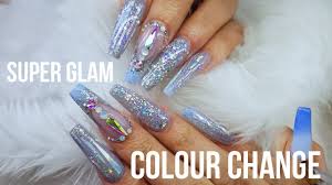Acrylic nail designs can be created with a blend of matte black and shiny silver. Long Acrylic Nails Blue Glam Holographic Colour Change Acrylic Extreme Sparkle Youtube