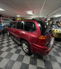 Image result for Red 2003 Envoy