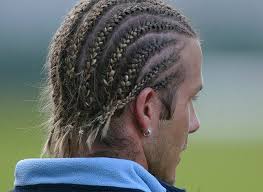 Another styling trick that takes little effort on his part is to place a plastic headband in the hair that pulls the front back from his face. David Beckham A Career In Hairstyles In Pictures Football The Guardian