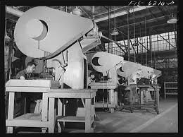 Nashville, Tennessee. Stamping out parts for bombers. Vultee ...