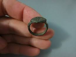 But security metal detectors are adjusted so they aren't usually set off by something like earrings or a ring if that is what you mean. Roman Bronze Ring Metal Detector Find Ancient Vatican