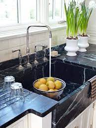 It looked kind of like oatmeal had been dumped in the sink and not rinsed. Custom Soapstone Sink Kitchens