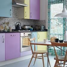 A Pastel Kitchen With Purple Lavender Yellow And Blue Cabinets For A Color Block Effect Kitchen Design Kitchen Plans Kitchen Decor
