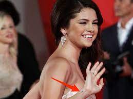 The punctuation mark isn't just a trend, though; Selena Gomez S 15 Known Tattoos A Complete Guide To Her Ink