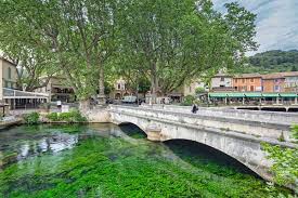 The boundaries of the vaucluse are defined by the valley of the rhone in the west, which provides irrigation for this land of fruit vegetables and reputed vinyards. Vaucluse France Travetou