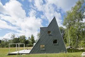 It is built into the wall and breaks the eave lines in a building. Summer House In Dalarna Triangular Villa By Leo Qvarsebo Wowow Home Magazine