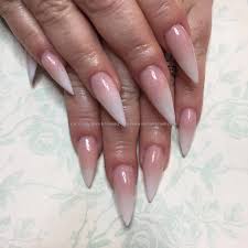 A celeb favorite, stiletto nails are still a trending nail shape. Pink And Red Ombre Stiletto Nails Nail And Manicure Trends