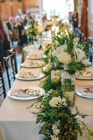 A Rustic Green And White Wedding Every Last Detail Rustic Wedding Decor Wedding Table Flowers Wedding Table Ideas Red