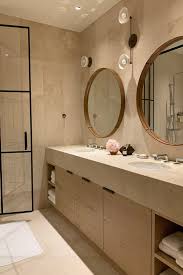 under 50 bathroom updates poosh bathroom update kardashian bathroom round mirror bathroom