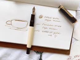 A yummy grail achieved. ☺️☕️ Pelikan M200 Cafe Creme, upgraded with an M400  EF gold nib, and inked up with @robertostersignature Caffe Crema 🤤 ahhhh  soothe