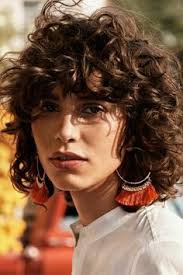 Short curly hairstyle for older women. 70s Bangs Curly Novocom Top