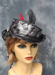 looking for feedback this is my first attempt of making a gothic or  steampunk hat in this fabric it went together pretty well .what do you all  think 🤔 😊