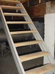Many prefabricated straight staircases use wood for treads, risers, balusters, and handrails, but some staircases use a combination of wood and metal for strength. Basement Stair Stringers By Fast Stairs Com