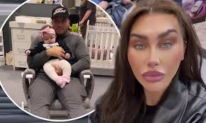 Pregnant Lauren Goodger attends baby show with on-off beau Charles Drury
