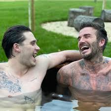 From his daughter, harper's 'drawing' tattoo inked on his hand to the sweet '99' tattoo carved on his pinky finger, the handsome. David Beckham And Son Brooklyn Show Off Their Tattoos As They Strip Off For An Outdoor Ice Bath