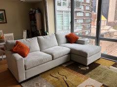 Slightly used living room couch/sofa and chair set. Crate And Barrel Axis Ii Sectional In Douglas Ice Color