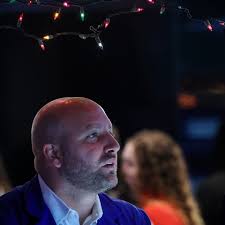 Wall St closes higher ahead of Fed; crude tumbles