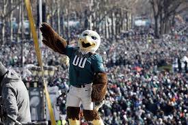 A fans reacts to super bowl lii by climbing a trash truck on walnut street near city hall on february 4, 2018 in downtown philadelphia, pennsylvania. 6 Highlights From The Eagles Super Bowl Parade Whyy