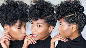 This curly updo hairstyle sits right with short hair or for anyone who has chosen to go natural and wants to grow out their curls! If You Think You Re Good At Creating Beautiful Updos Just Wait Until You See Naptural85 In Action African American Hairstyle Videos Aahv
