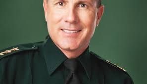 IN PICTURES: NEW POLICE OFFICERS & DEPUTIES SWEAR TO PROTECT & SERVE