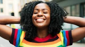 Long black hair with big perm curls. 7 Ways To Look Flawless While Transitioning To Natural Hair Self