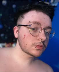 okay... i already asked about haircuts but now heres another thing... what  else could i do to look/feel more masculine and passing? removing any of my  piercings is absolutely OFF the table