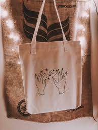 Source By Lionorapetkova Astrology Bag Celestial Cotton Eco Hands Illustrated Moon Stars Tote Tot Embroidered Tote Bag Diy Tote Bag Custom Tote Bags