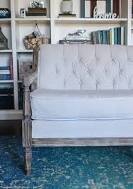 We recover our cushions regularly because they were looking a bit worn, but are still perfectly comfortable. How To Reupholster A Couch On The Cheap Lovely Etc