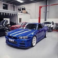 Interior is relatively stock to maintain streetability. Nissan Skyline R34 Gtr Blue And White Rims Perfect Nissan Skyline Skyline Gtr Gtr R34