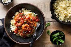 Spicy Greek Shrimp With Tomatoes Feta And Orzo Recipe Greek Shrimp Greek Dishes Healthy Cooking