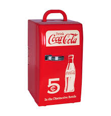 This compact cooler replicates the classic coke can design, and can be used in your vehicle. Coca Cola Retro Style Mini Fridge 12v Dc 110v Ac 22 L