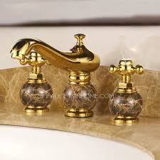 It has a rating of 4.8 with 132 reviews. Antique Gold Marble Handle Three Hole Bathroom Sink Faucet