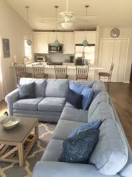 Friday Favorite Beach Condo Make Over Coastal Decorating Living Room Ashley Furniture Living Room Beach Condo Decor