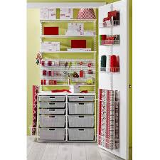 I like the storage bins that fit perfectly into their cubbies! White Elfa Wrapper S Dream Closet The Container Store