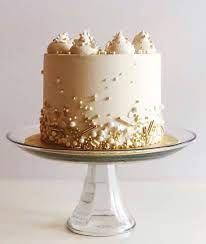 Beat in the eggs, one at a time, then stir in the vanilla. 20 Elegant White And Gold Cake Designs The Wonder Cottage Golden Birthday Cakes Elegant Birthday Cakes Pretty Birthday Cakes