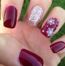 of red nails with a silver glitter one