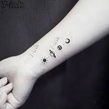 Rather, it depicts them as a part of the whole solar system. Water Transfer Tattoo Sticker Cute Lovely Sun Moon Saturn Art Waterproof Temporary Tatoo Flash Fake Tatto For Women Men Temporary Tattoos Aliexpress