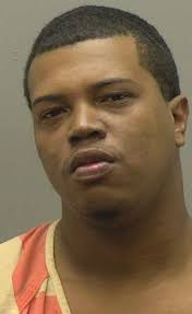 Woman shot in Burlington; suspect held