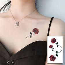 Only god can judge me. Red And Green Small Rose Tattoo Below Left Collar Bone For Women