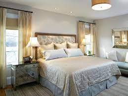 Grays on the walls and bedding prevent the space from feeling too bold. Blue Grey And Gold Bedroom Novocom Top