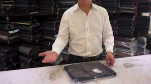 How To Fold Pants To Pack Without Wrinkling How To Fold Pants Pants Mens Tops