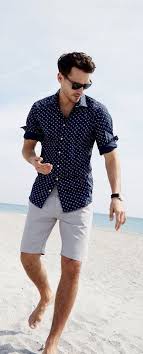 Black And White Shorts Outfit Men Summer Outfit Inspiration With A Navy Polka Dot Button Up Shirt With Roll Up Sleeves Black Leather Bande Spring Outfits Men Summer Outfits Men Mens Beach Style