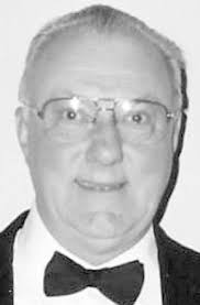 JOHN E. FRANK Obituary